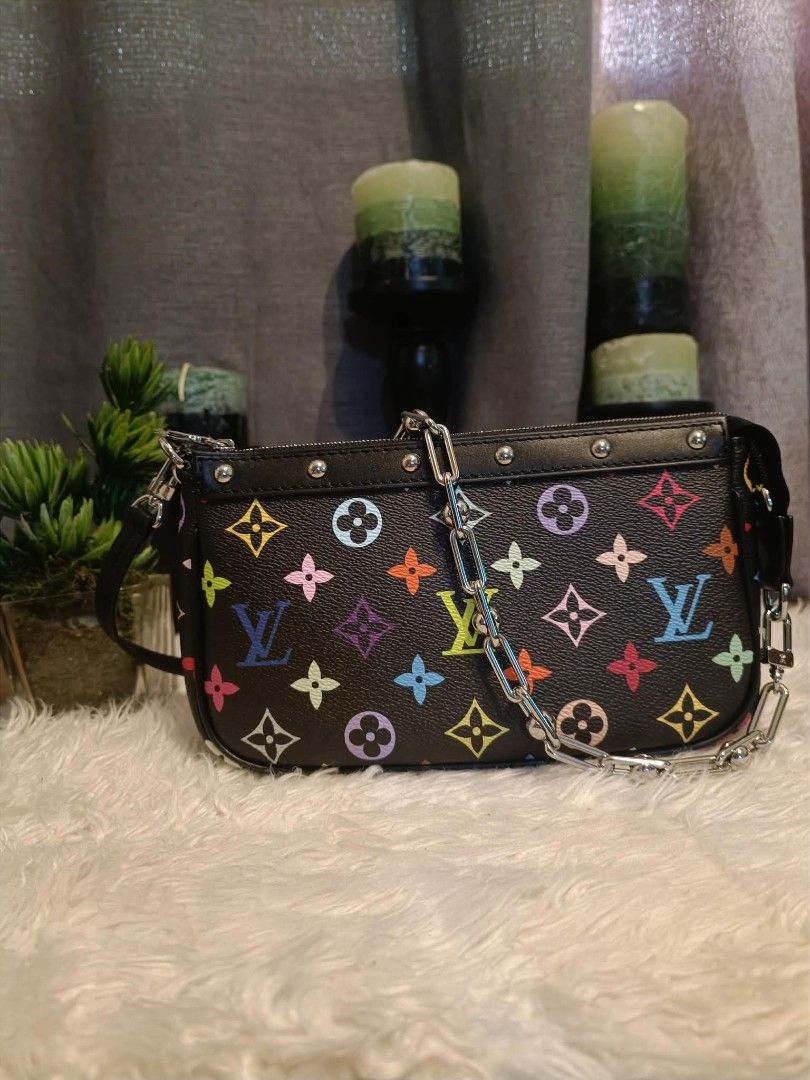 LV pochette kelly bag (Category: Luxury Bags & Wallets) located in San Juan City. Submitted by cheryl20624 (Listing ID 1431069615, Image 1). Description: -Black LV kelly bag with colorful monogram-style print -smooth leather-like / coated canvas material -multicolor design on dark background (very Eye-catching) -zipper closure -compact size,perfect for essentials (phone, wallet, lip products) -can be worn as shoulder bag or small handbag #fyp #fo