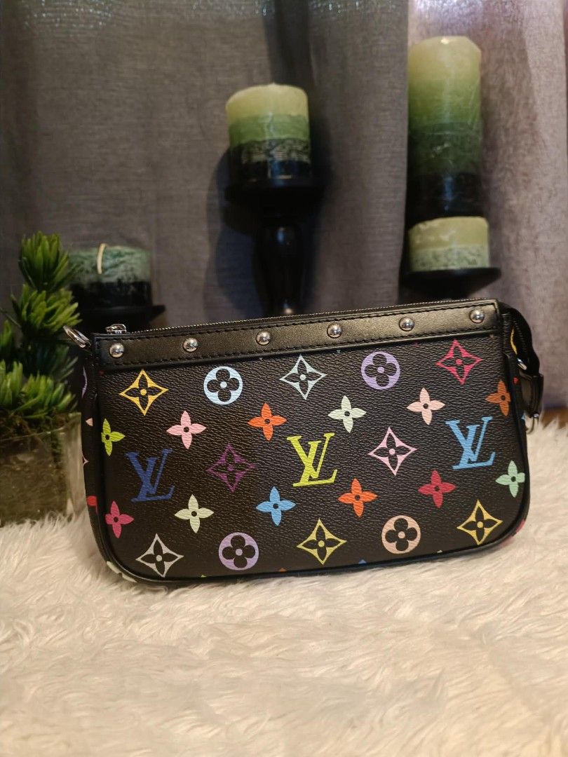 LV pochette kelly bag (Category: Luxury Bags & Wallets) located in San Juan City. Submitted by cheryl20624 (Listing ID 1431069615, Image 3). Description: -Black LV kelly bag with colorful monogram-style print -smooth leather-like / coated canvas material -multicolor design on dark background (very Eye-catching) -zipper closure -compact size,perfect for essentials (phone, wallet, lip products) -can be worn as shoulder bag or small handbag #fyp #fo