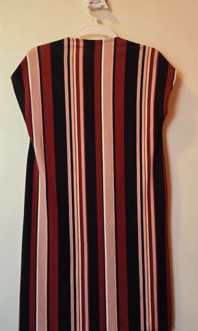 Mango Basics V-Neck striped Dress - Size XS (Category: Dresses) located in Pasig City. Submitted by ac_ya (Listing ID 1431055290, Image 2). Description: Mango Basics V-Neck striped Dress Size: XS Colors: Black, White, Maroon and Pink Fabric is stretchy, with one sleeve needing retouch on stitching but otherwise in perfect condition. RFS: Decluttering.