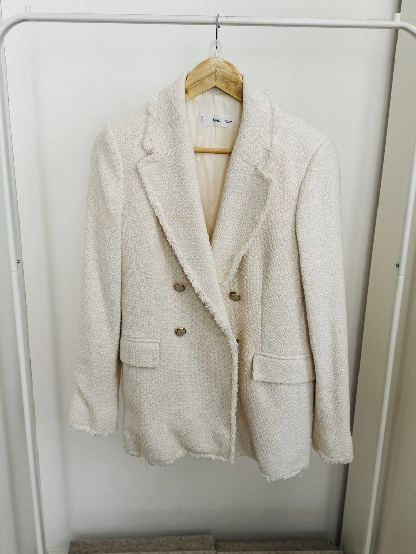 Mango Tweed double breasted blazer USA Medium (Category: Coats, Jackets and Outerwear) located in Cavite. Submitted by chaidc (Listing ID 1431080344, Image 2). Description: Brand: Mango Item: Tweed Double-Breasted Blazer Size: US Medium Color: White Details: • Textured tweed fabric • Gold button front • Structured silhouette • Fully lined .