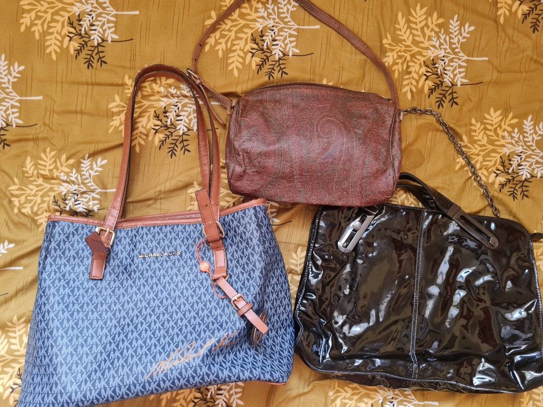 Michael Kors, Etro, Ted Baker bundle (Category: Luxury Bags & Wallets) located in Quezon City. Submitted by thriftypieces (Listing ID 1431181203, Image 1). Description: Three beautiful preloved branded bags sold as bundle (expect signs of use) 🦋Michael Kors- shoulder bag, color chipped at the lining (pwede i repaint), may small tastas sa loob, you can use as an office bag 🦋Etro-leather shoulder bag can fit small payong, phone, and make up essen