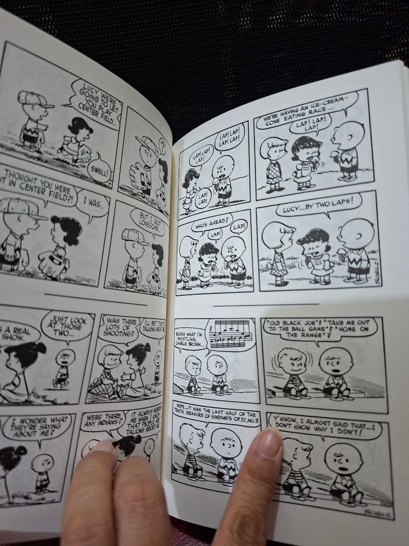 More Peanuts by Charles M. Schulz (Category: Comics & Manga) located in Pasig City. Submitted by loisegems (Listing ID 1430981211, Image 3). Description: Book features the comic strip "More Peanuts" by Charles M. Schulz. The cover shows Charlie Brown, Lucy, and a toy duck. The book contains black and white comic strips. It's a great item for Peanuts fans..