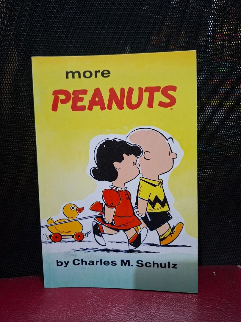 More Peanuts by Charles M. Schulz (Category: Comics & Manga) located in Pasig City. Submitted by loisegems (Listing ID 1430981211, Image 1). Description: Book features the comic strip "More Peanuts" by Charles M. Schulz. The cover shows Charlie Brown, Lucy, and a toy duck. The book contains black and white comic strips. It's a great item for Peanuts fans..