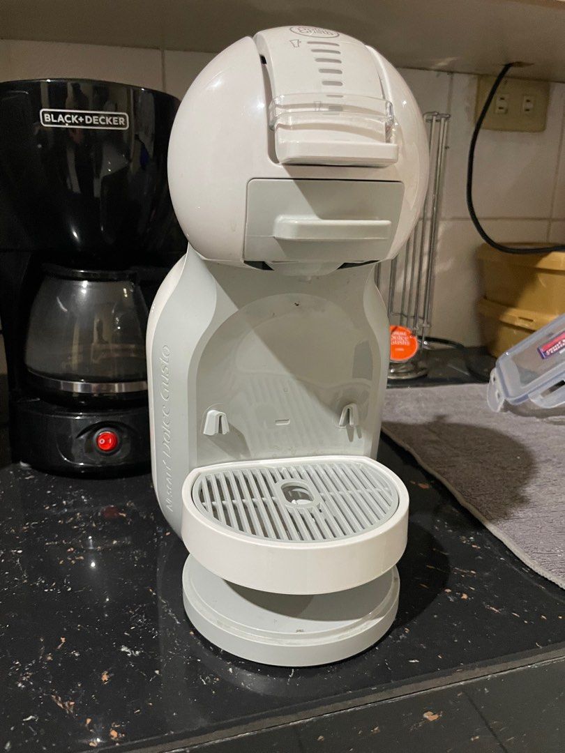 Nescafe Dolce Gusto Coffee Machine (Category: Coffee & Tea Tableware) located in Paranaque City. Submitted by loonanbtsstan (Listing ID 1431053579, Image 1). Description: .