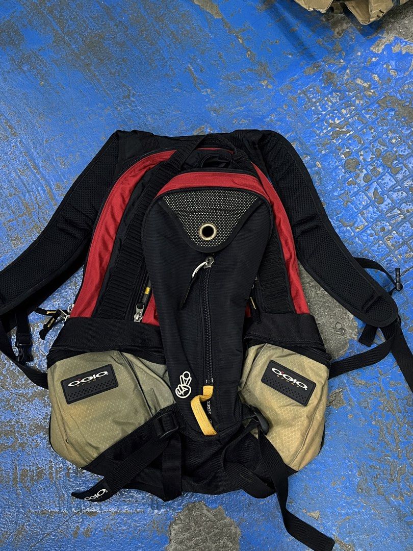 OGIO Avalanche Backpack (Category: Backpacks) located in Bulacan. Submitted by sef19 (Listing ID 1430991450, Image 1). Description: OGIO Avalanche backpack features multiple compartments and pockets for organized storage. It has a black and red color scheme with adjustable straps for a comfortable fit. The backpack includes a padded back panel and a top handle for easy carrying. It also has a front pocket with a mesh detail and side pockets. Made