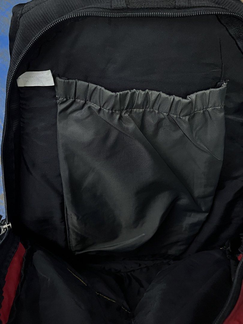 OGIO Avalanche Backpack (Category: Backpacks) located in Bulacan. Submitted by sef19 (Listing ID 1430991450, Image 2). Description: OGIO Avalanche backpack features multiple compartments and pockets for organized storage. It has a black and red color scheme with adjustable straps for a comfortable fit. The backpack includes a padded back panel and a top handle for easy carrying. It also has a front pocket with a mesh detail and side pockets. Made