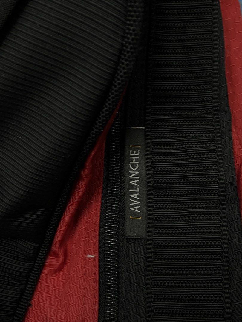OGIO Avalanche Backpack (Category: Backpacks) located in Bulacan. Submitted by sef19 (Listing ID 1430991450, Image 3). Description: OGIO Avalanche backpack features multiple compartments and pockets for organized storage. It has a black and red color scheme with adjustable straps for a comfortable fit. The backpack includes a padded back panel and a top handle for easy carrying. It also has a front pocket with a mesh detail and side pockets. Made