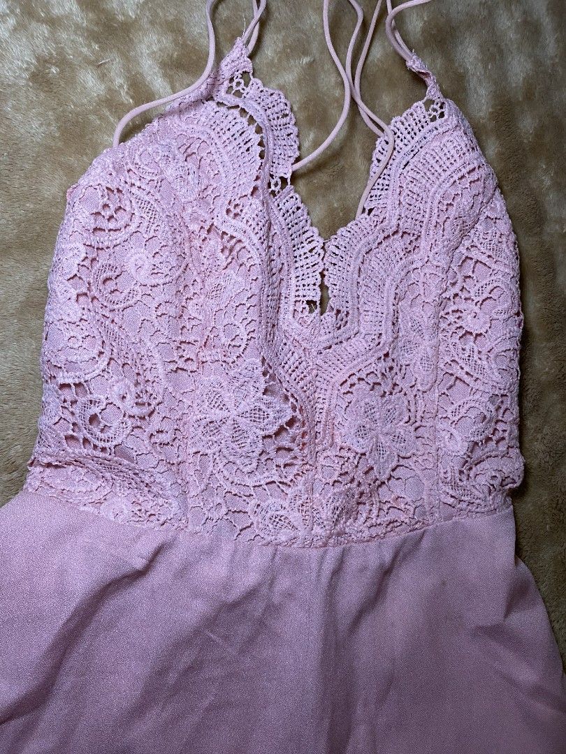 Pink Lace Trim Dress (Category: Dresses) located in Quezon City. Submitted by reveuses (Listing ID 1431095267, Image 2). Description: Dress features a delicate lace trim on the bodice and spaghetti straps. It has a soft, pink color and a flowing design. The dress has a V-neckline and a comfortable fit..
