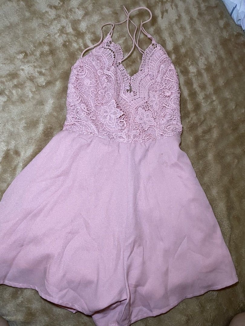 Pink Lace Trim Dress (Category: Dresses) located in Quezon City. Submitted by reveuses (Listing ID 1431095267, Image 1). Description: Dress features a delicate lace trim on the bodice and spaghetti straps. It has a soft, pink color and a flowing design. The dress has a V-neckline and a comfortable fit..
