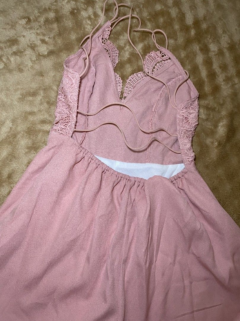 Pink Lace Trim Dress (Category: Dresses) located in Quezon City. Submitted by reveuses (Listing ID 1431095267, Image 3). Description: Dress features a delicate lace trim on the bodice and spaghetti straps. It has a soft, pink color and a flowing design. The dress has a V-neckline and a comfortable fit..