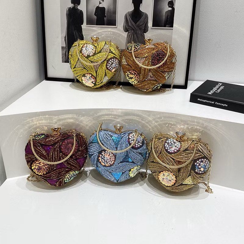 (PRE-ORDER) VALEEN Heart Sequin Clutch Bag (Category: Clutches) located in Marikina City. Submitted by lorali.ph (Listing ID 1431167280, Image 1). Description: Dimensions:15*5*15cm Size: can’t fit phone Lining Material:Polyester Closure Type: Clasp Compactness: Hard Number of Handles/Straps:Single weight: 270-300g *color may vary due to lighting during photoshoot or color setting in mobile or computer FOR PRE-ORDER Lead time: 8-14 days ~we requir