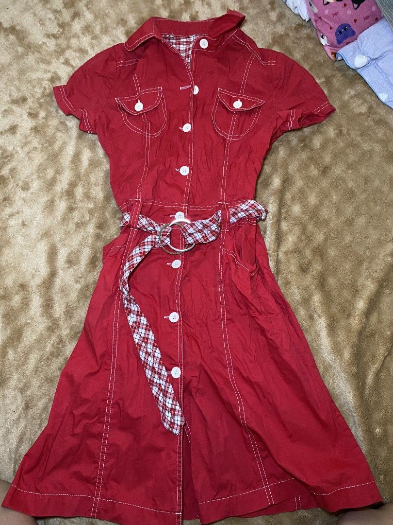 Red Dress with Belt (Category: Dresses) located in Quezon City. Submitted by reveuses (Listing ID 1431096440, Image 1). Description: Red dress with a matching belt. Features white buttons and pockets on the chest. The belt has a checkered pattern. It has short sleeves and a classic design..