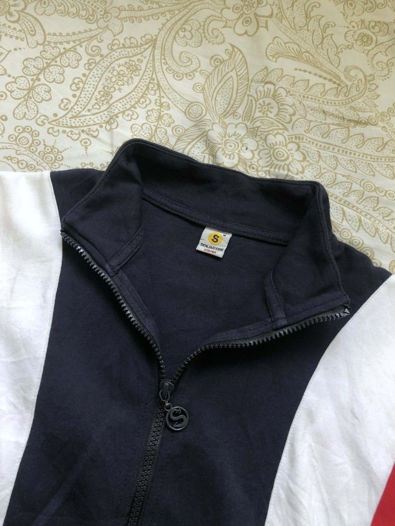 Retro Tri-Color Jacket (Category: Coats, Jackets and Outerwear) located in Tiwi. Submitted by threadbound (Listing ID 1431097617, Image 3). Description: Lightweight gray short-sleeve zip-up jacket, versatile and easy to style. Smooth zipper and clean prints. Freesize fits M-L comfortably. Perfect for layering or casual activewear..