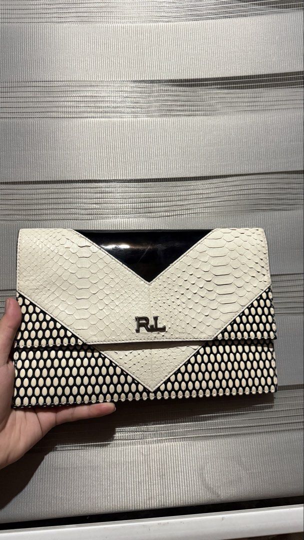 Rouge & lounge clutch bag with sling (Category: Luxury Bags & Wallets) located in Calamba. Submitted by ashvault (Listing ID 1431140014, Image 1). Description: Rouge&Lounge clutch bag with sling Can be used for events or if you like snake skin for daily use. Can fit ipad mini and long wallet.