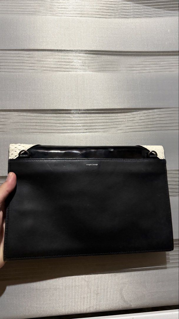 Rouge & lounge clutch bag with sling (Category: Luxury Bags & Wallets) located in Calamba. Submitted by ashvault (Listing ID 1431140014, Image 2). Description: Rouge&Lounge clutch bag with sling Can be used for events or if you like snake skin for daily use. Can fit ipad mini and long wallet.