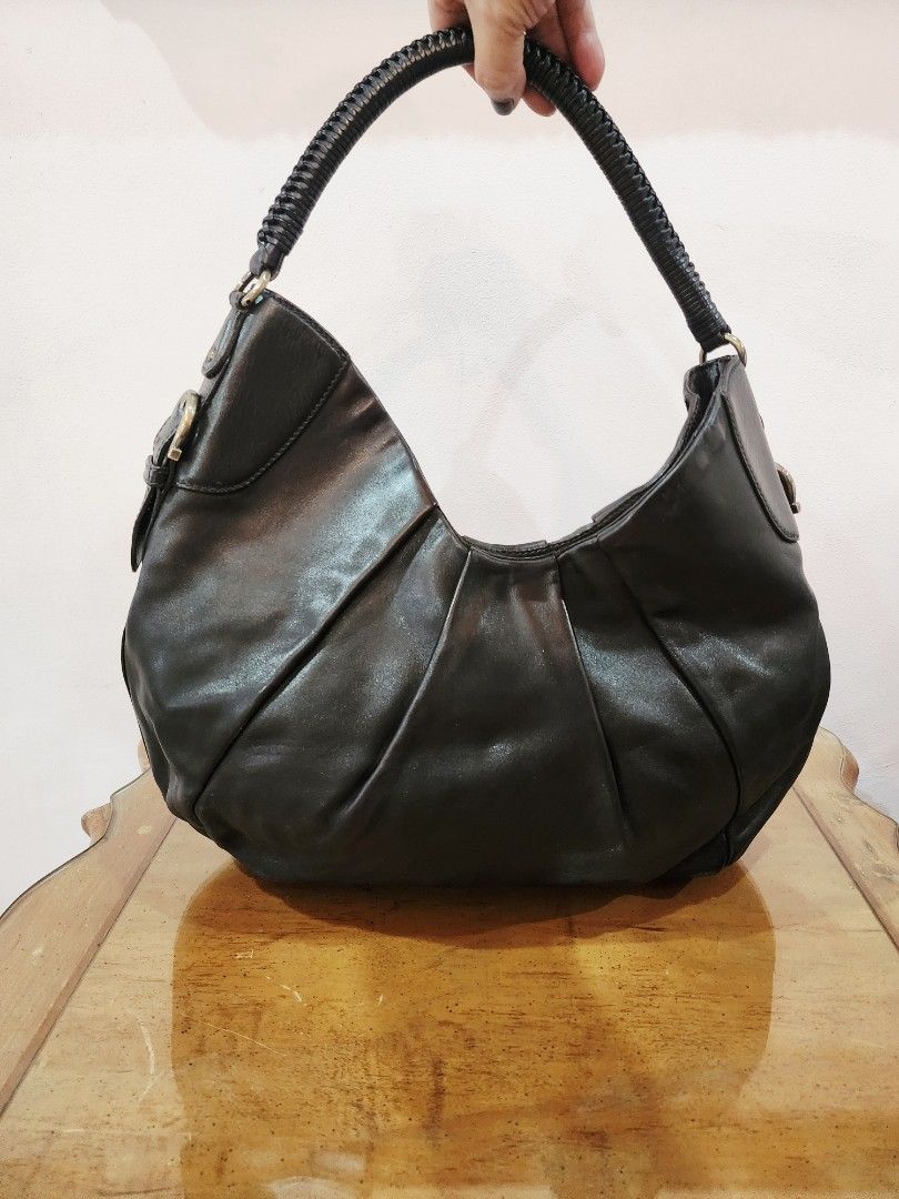 Salvatore Ferragamo Hobo Bag (Category: Luxury Bags & Wallets) located in Valenzuela. Submitted by absolutelychick (Listing ID 1324123840, Image 2). Description: L 17" x W 6" x H 15" Large size meron pong konting light fade sa back lips ng bag, konting light nail scratches jrs, lbc, j&t lalamove/grab ready.