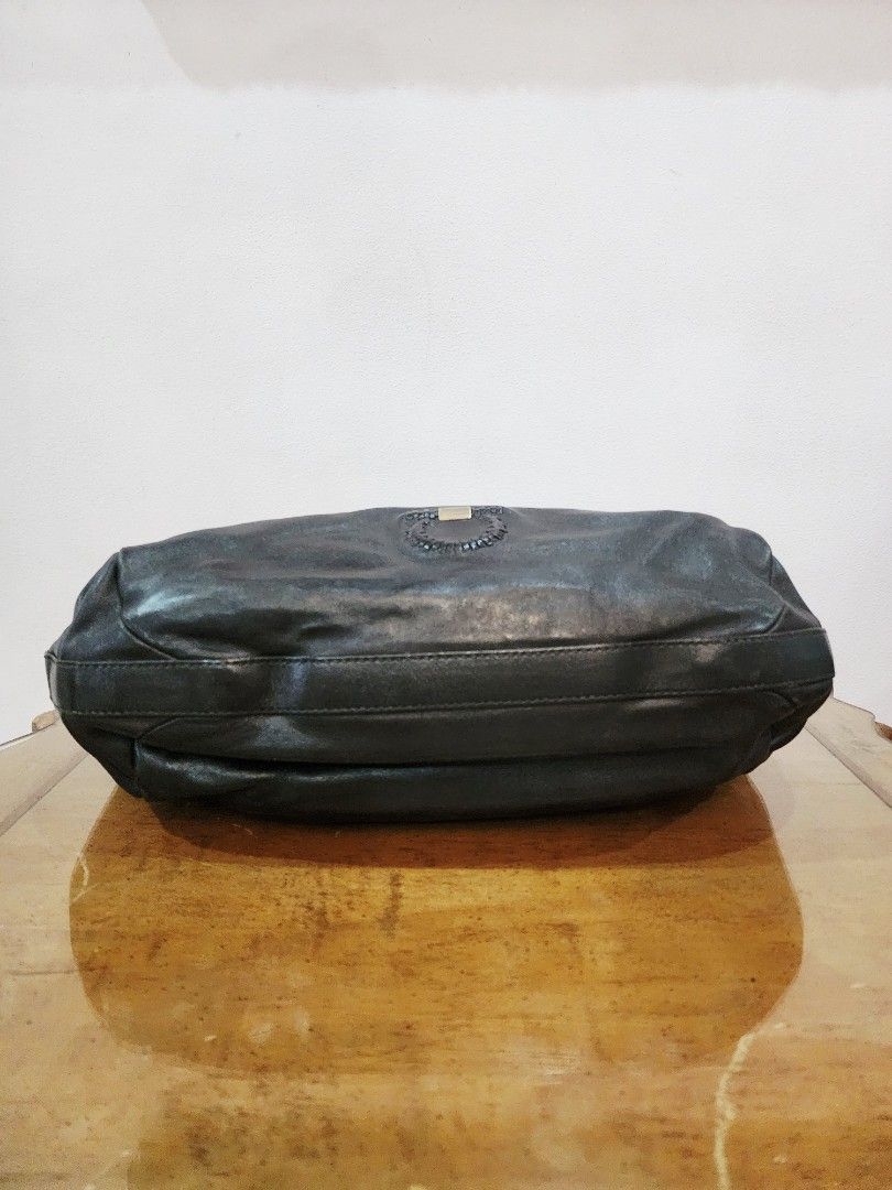 Salvatore Ferragamo Hobo Bag (Category: Luxury Bags & Wallets) located in Valenzuela. Submitted by absolutelychick (Listing ID 1324123840, Image 3). Description: L 17" x W 6" x H 15" Large size meron pong konting light fade sa back lips ng bag, konting light nail scratches jrs, lbc, j&t lalamove/grab ready.