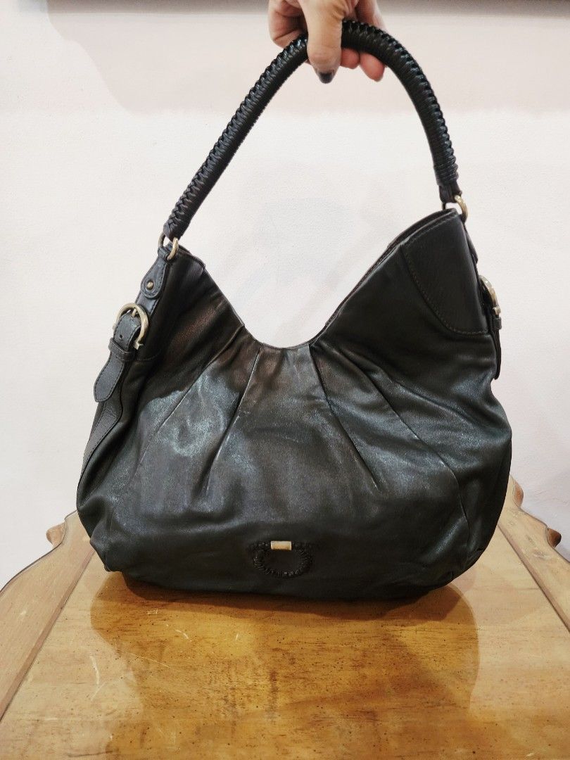 Salvatore Ferragamo Hobo Bag (Category: Luxury Bags & Wallets) located in Valenzuela. Submitted by absolutelychick (Listing ID 1324123840, Image 1). Description: L 17" x W 6" x H 15" Large size meron pong konting light fade sa back lips ng bag, konting light nail scratches jrs, lbc, j&t lalamove/grab ready.