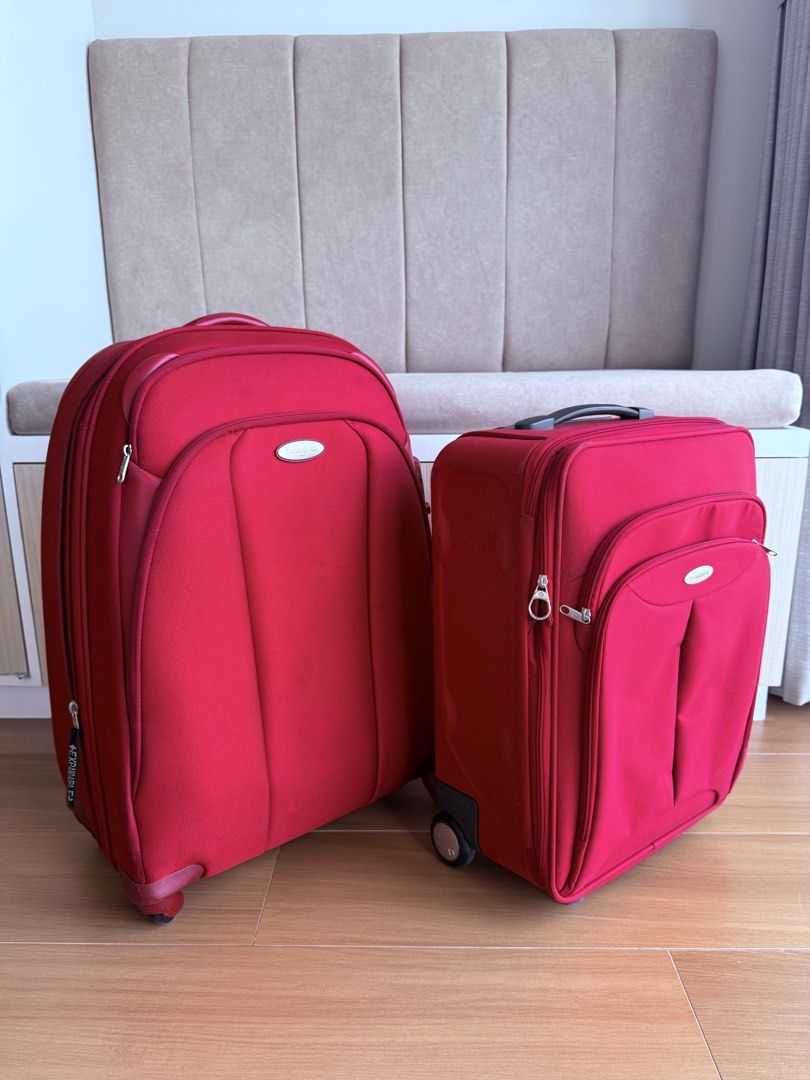 Samsonite Red Luggage Set (Category: Luggage) located in Santa Cruz. Submitted by imkikay (Listing ID 1431102200, Image 1). Description: - Samsonite Red Luggage Set - Includes two pieces - Lightweight - Features a security lock - Expandable design for extra space - Vibrant red color - Condition: 8/10 - Perfect for travel.