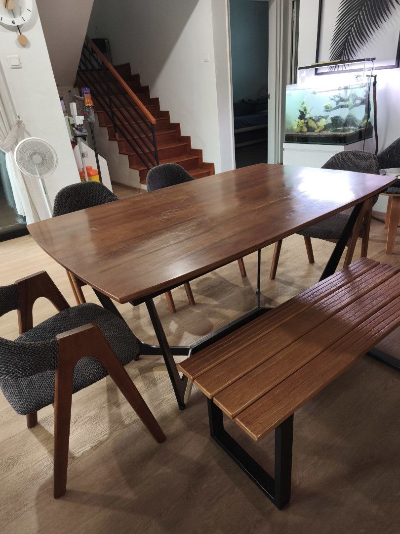 Solid wood dining table (table only) (Category: Tables & Sets) located in Singapore. Submitted by ccing_12 (Listing ID 1430983735, Image 1). Description: Well used dining table with solid wood table top and sturdy metal leg. need to clear from house asap as have purchased new table. 1.5mx0.9mx0.76m Arrange own pickup please..
