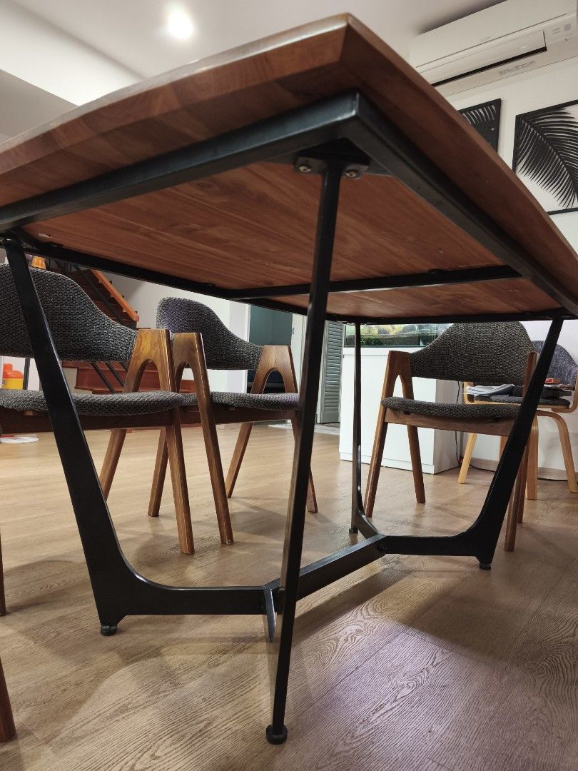 Solid wood dining table (table only) (Category: Tables & Sets) located in Singapore. Submitted by ccing_12 (Listing ID 1430983735, Image 3). Description: Well used dining table with solid wood table top and sturdy metal leg. need to clear from house asap as have purchased new table. 1.5mx0.9mx0.76m Arrange own pickup please..