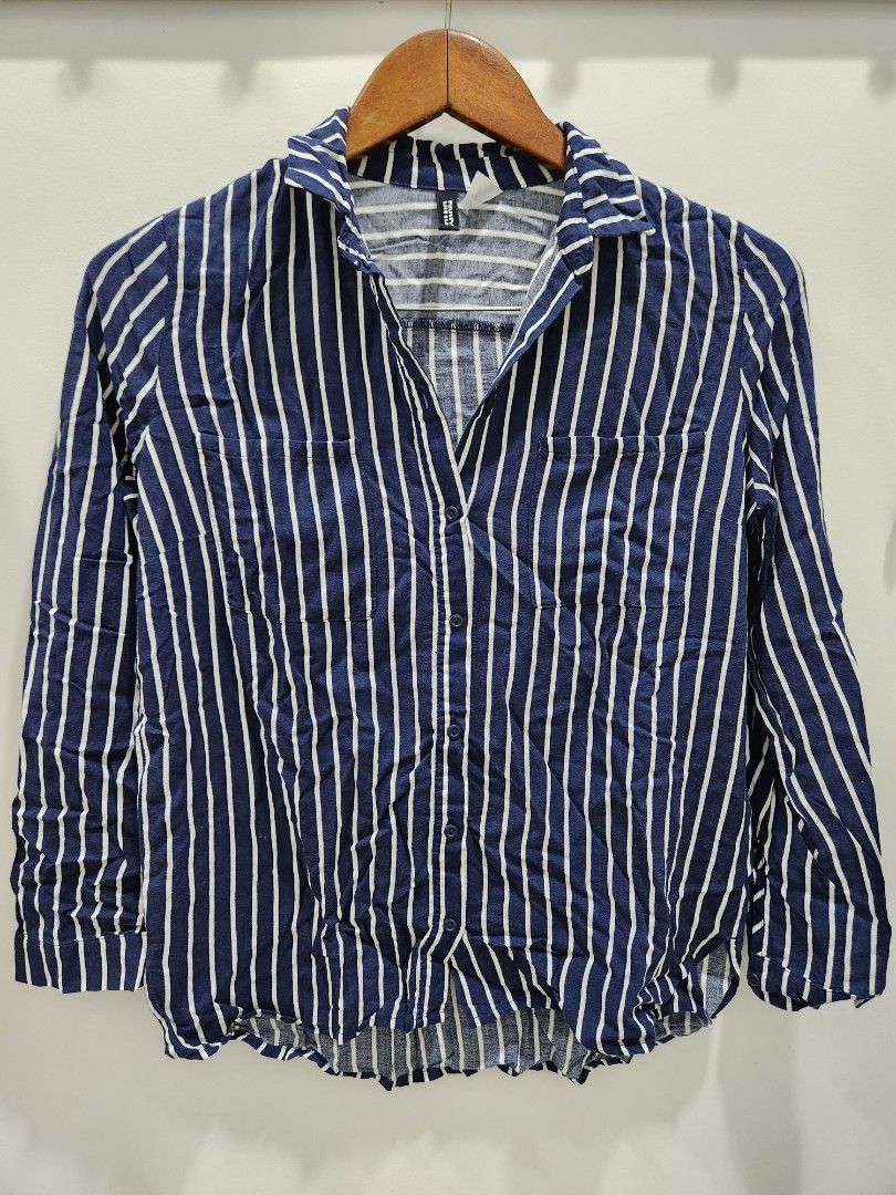 H&M Striped Long Sleeve Shirt (Category: Longsleeves) located in Quezon City. Submitted by mlcl62336 (Listing ID 1431021253, Image 1). Description: Navy blue and white striped long sleeve shirt. extra button intact.
