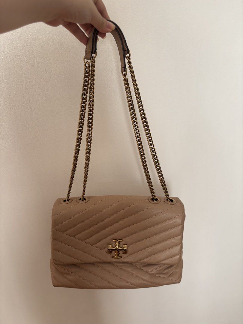 Tory Burch Kira Chevron Shoulder Bag (Category: Luxury Bags & Wallets) located in Manila. Submitted by curtsysprettythings (Listing ID 1431040746, Image 2). Description: Some flaws indicated on the photos Creases and pen mark Used less than 5 times, creases came from closet storage 100% authentic .