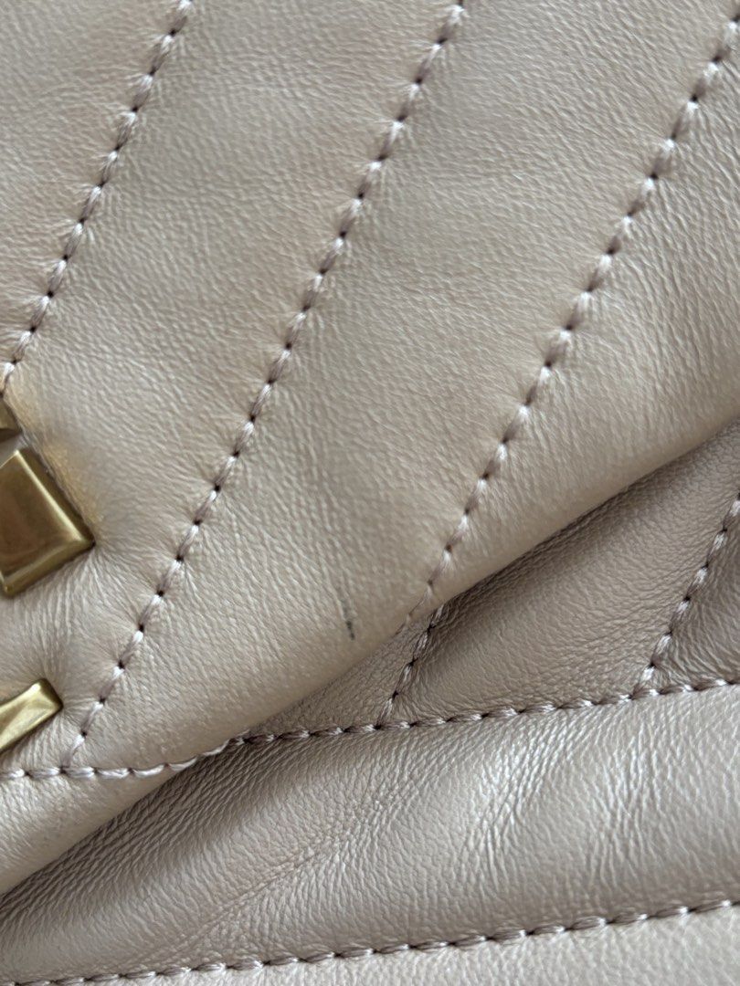 Tory Burch Kira Chevron Shoulder Bag (Category: Luxury Bags & Wallets) located in Manila. Submitted by curtsysprettythings (Listing ID 1431040746, Image 3). Description: Some flaws indicated on the photos Creases and pen mark Used less than 5 times, creases came from closet storage 100% authentic .