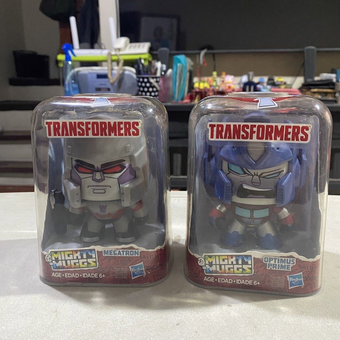 Transformers Mighty Muggs Megatron & Optimus Prime (Category: Figurines & Statues) located in Bacoor. Submitted by pearlycchels (Listing ID 1431076000, Image 3). Description: Hasbro Mighty Muggs Megatron and Optimus Prime Changing Face - good condition - no issues - stored in box - not played - strictly sold as set - fixed price mod: jnt/lbc/lalamove mop: gcash/bpi loc: bacoor,cavite.