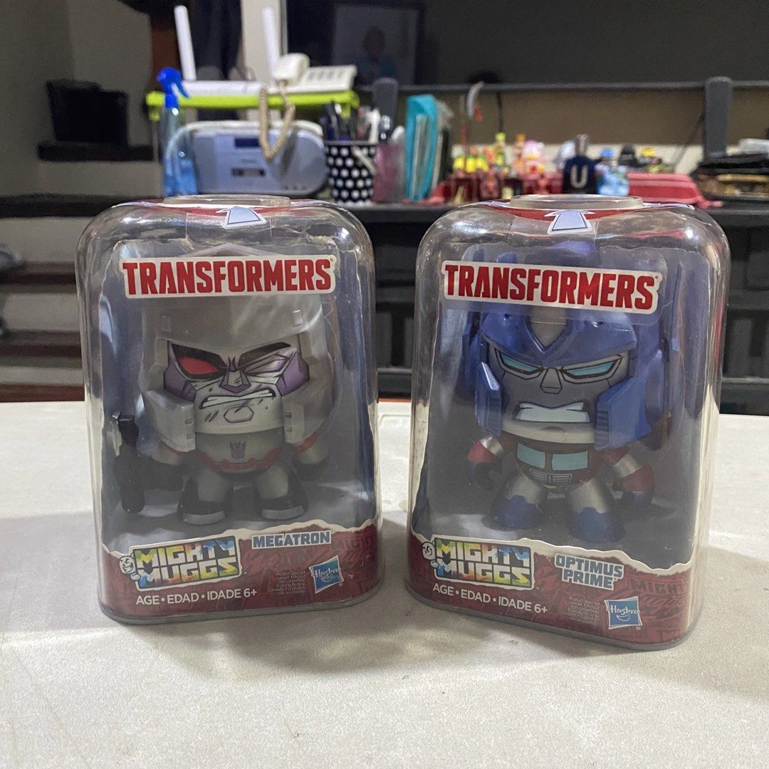 Transformers Mighty Muggs Megatron & Optimus Prime (Category: Figurines & Statues) located in Bacoor. Submitted by pearlycchels (Listing ID 1431076000, Image 1). Description: Hasbro Mighty Muggs Megatron and Optimus Prime Changing Face - good condition - no issues - stored in box - not played - strictly sold as set - fixed price mod: jnt/lbc/lalamove mop: gcash/bpi loc: bacoor,cavite.