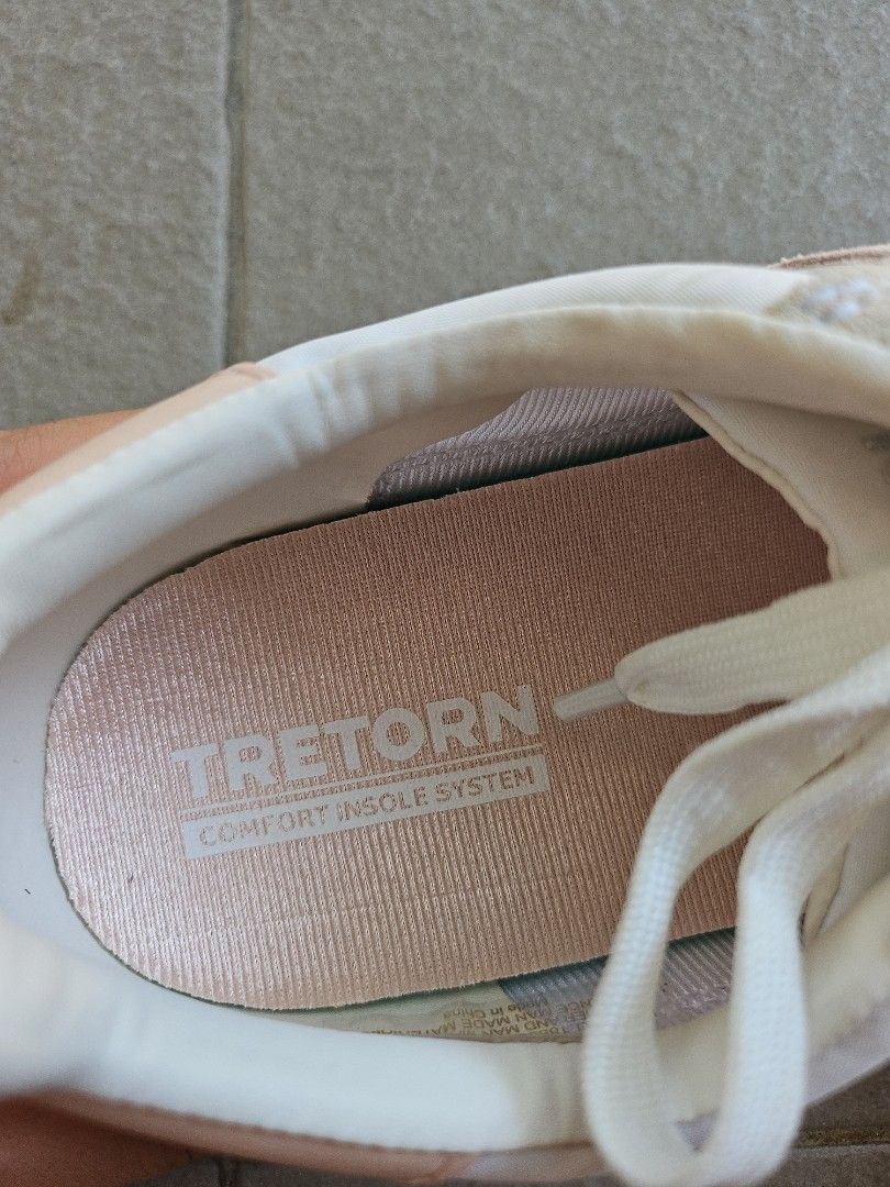 Tretorn Hailey Sneakers - Size 7.5 (Category: Sneakers) located in Muntinlupa City. Submitted by ycslash98 (Listing ID 1430987863, Image 2). Description: Tretorn Hailey sneakers in a cream and light pink colorway. Features a leather and man-made upper. The size is 7.5M. The soles have a unique hexagonal pattern. The insole has "Tretorn Comfort Insole System" printed on it. The shoes have white laces..