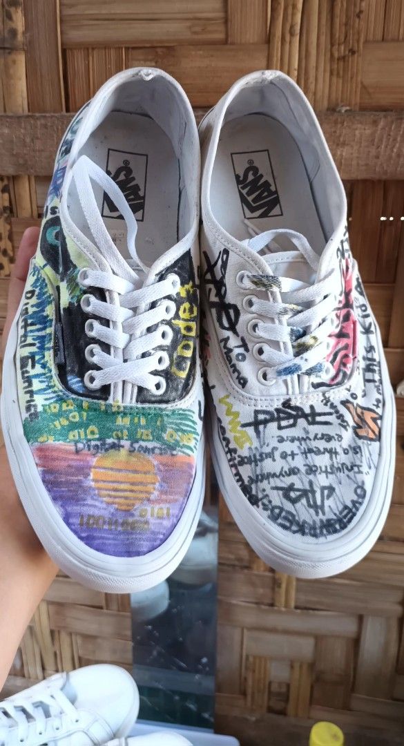 Vans Authentic Custom Graffiti Art (Category: Sneakers) located in Manila. Submitted by edmundopil44797 (Listing ID 1431027072, Image 1). Description: Customized Vans Authentic shoes with unique graffiti art design. Features a white base with colorful artwork on the upper. The shoes have white laces and a white sole. The size is US Men's 11.0, EUR 44.5, and CM 29.0..