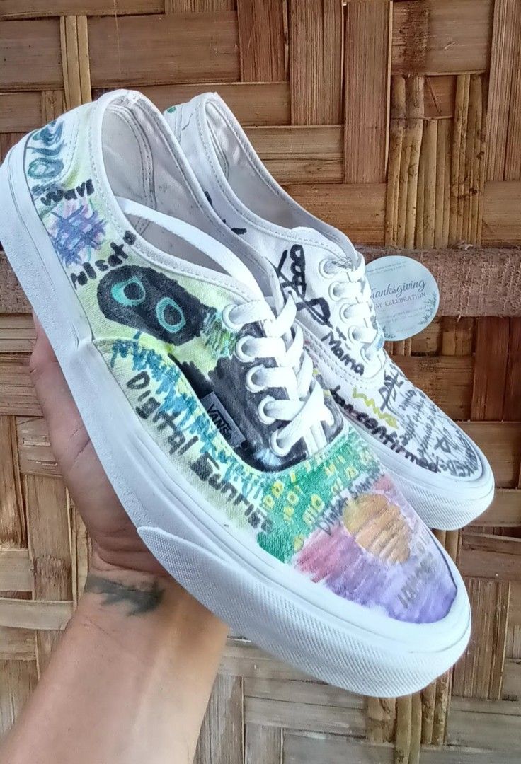 Vans Authentic Custom Graffiti Art (Category: Sneakers) located in Manila. Submitted by edmundopil44797 (Listing ID 1431027072, Image 3). Description: Customized Vans Authentic shoes with unique graffiti art design. Features a white base with colorful artwork on the upper. The shoes have white laces and a white sole. The size is US Men's 11.0, EUR 44.5, and CM 29.0..