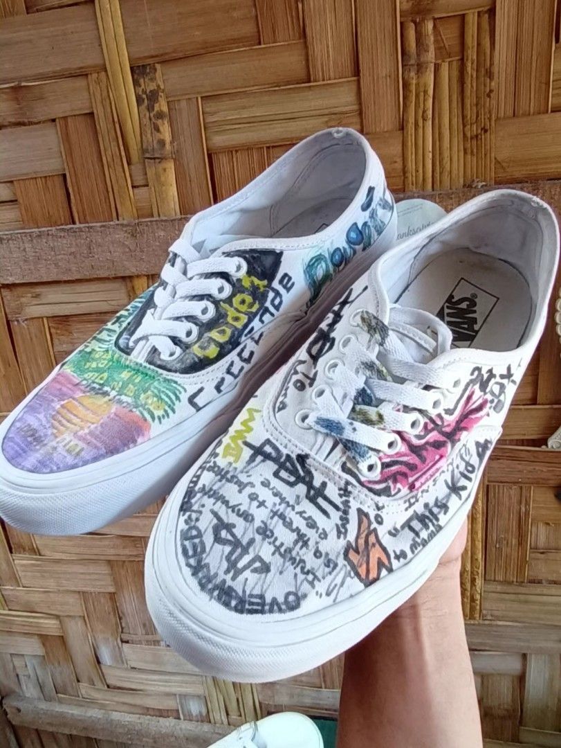Vans Authentic Custom Graffiti Art (Category: Sneakers) located in Manila. Submitted by edmundopil44797 (Listing ID 1431027072, Image 2). Description: Customized Vans Authentic shoes with unique graffiti art design. Features a white base with colorful artwork on the upper. The shoes have white laces and a white sole. The size is US Men's 11.0, EUR 44.5, and CM 29.0..