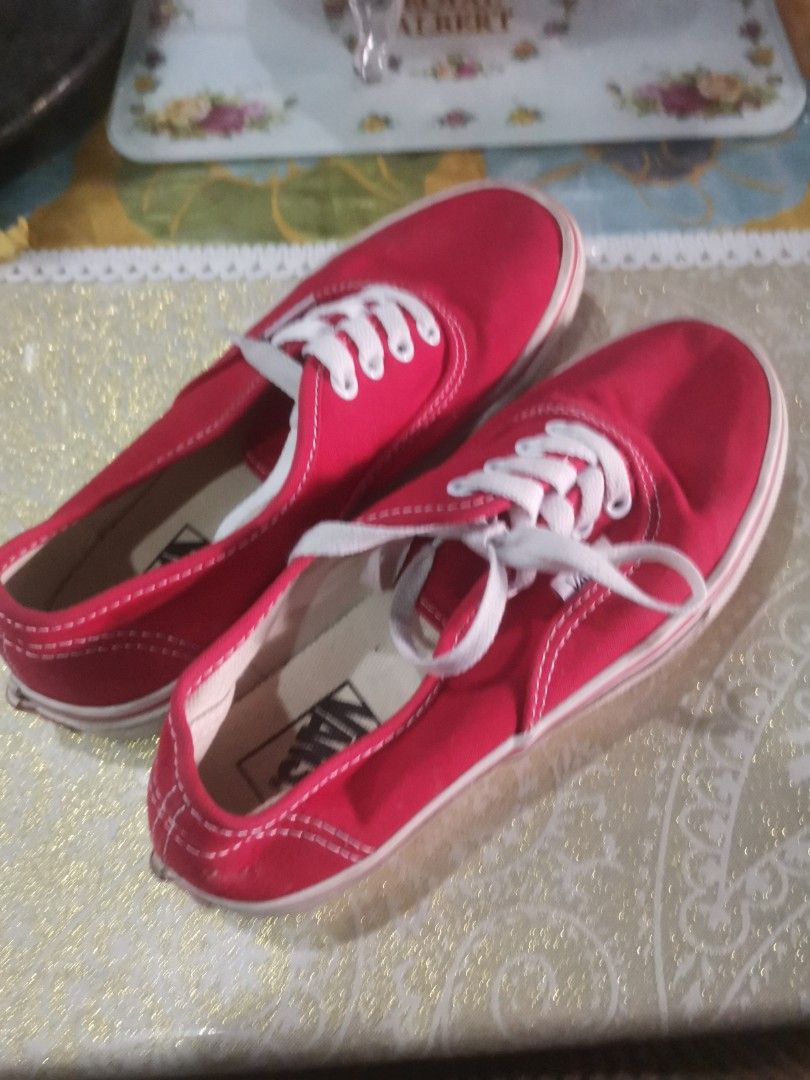Vans Authentic Red Sneakers for kids 21cm (Category: Sneakers) located in Paranaque City. Submitted by francismichaelwalrath2-28680 (Listing ID 1430984658, Image 2). Description: Classic red Vans Authentic sneakers. Features white laces and a white sole. The Vans logo is visible on the tongue and insole. The soles show some wear. A timeless design perfect for everyday wear..