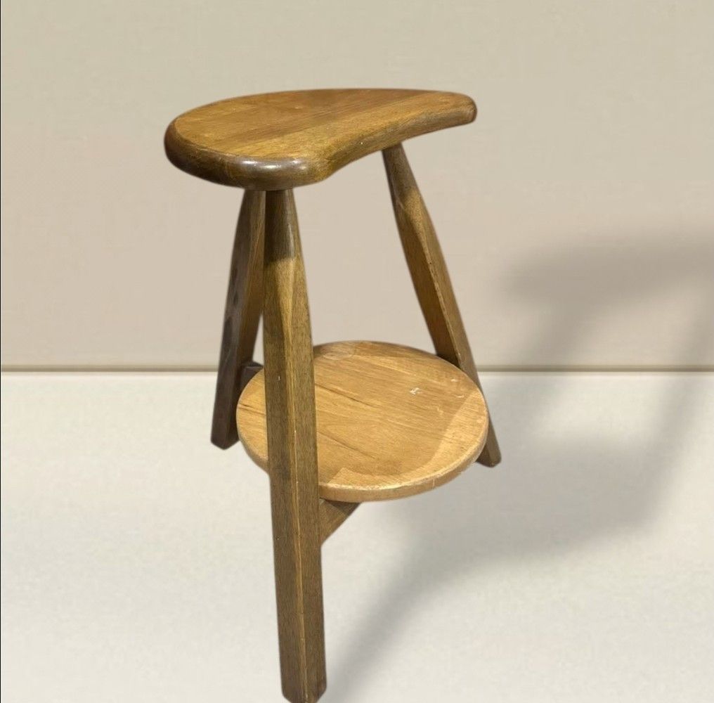 Vintage 3-legged Crescent-shape Stool Chair (Category: Chairs) located in Quezon City. Submitted by dannikkishoppe2 (Listing ID 1431010747, Image 1). Description: Vintage 3-legged Crescent-shape Stool Chair‼️₱2800‼️ *with lower round shelf *can be used as a side table *vintage *heavy wood These are SURPLUS items and not BRAND NEW. Please manage your expectations as there might be minimal flaws. Color may vary due to lighting, it may appear darker