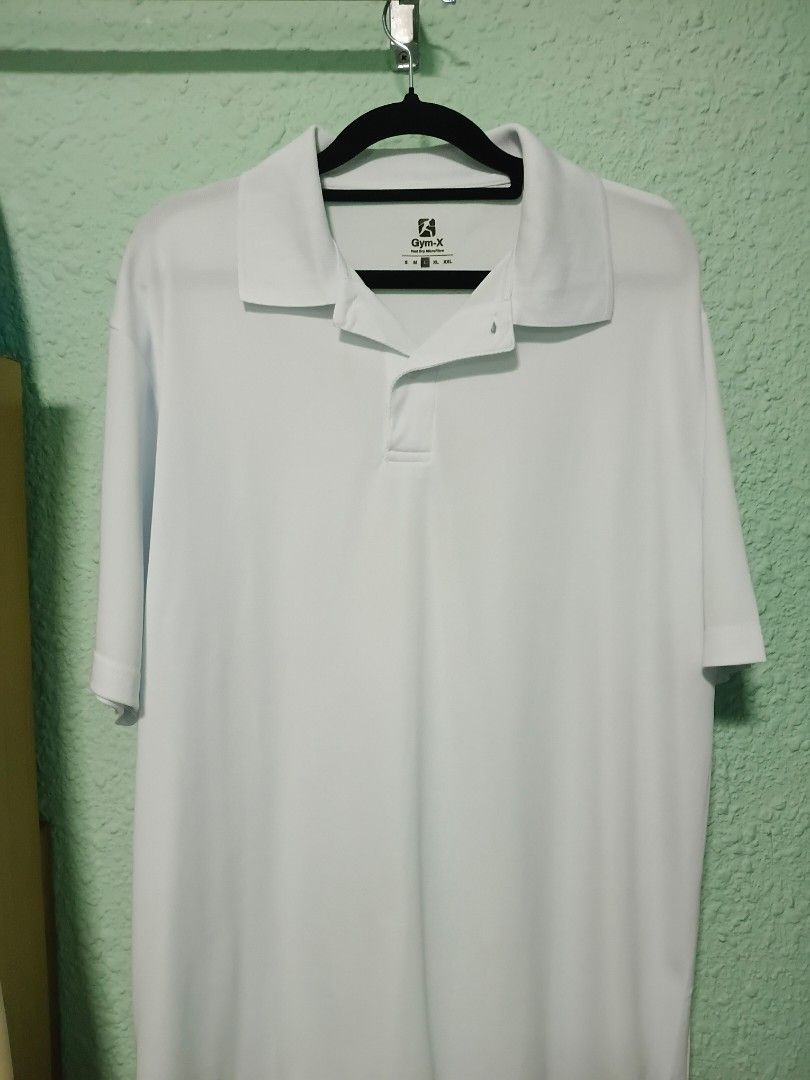 White Polo Shirt (Category: Tshirts & Polo Shirts) located in Singapore. Submitted by deal2today (Listing ID 1431011959, Image 1). Description: White polo shirt from Domyos. Simple and versatile design, perfect for sports or casual wear. The shirt is clean and well-maintained. A great addition to any wardrobe..