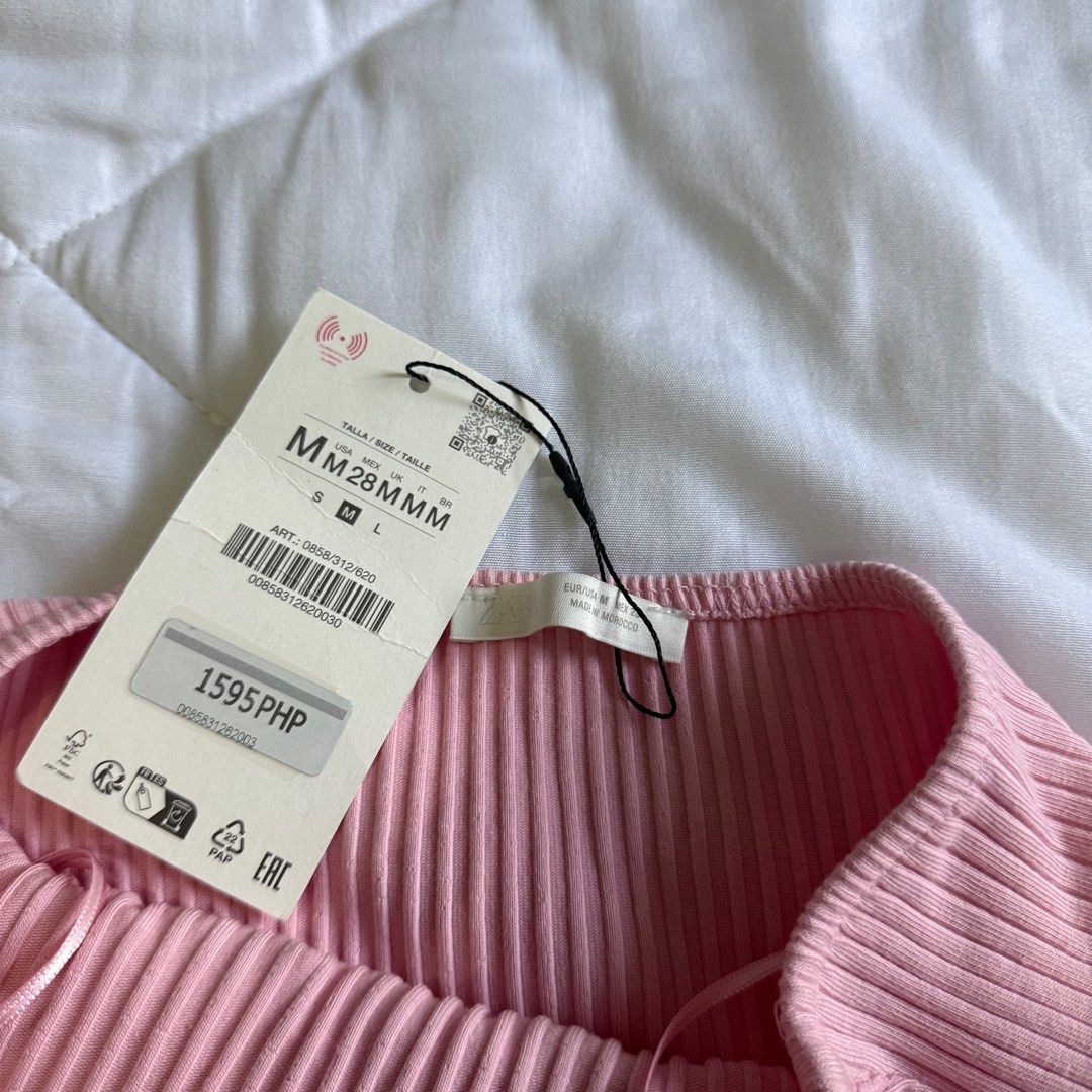Zara Pink Ribbed Button Halter Top (Category: Sleeveless) located in Manila. Submitted by shop.declutter (Listing ID 1431021777, Image 2). Description: Super pretty in actual!! Can adjust the strap length based on ur liking :) Stretch fabric True to size (medium) .