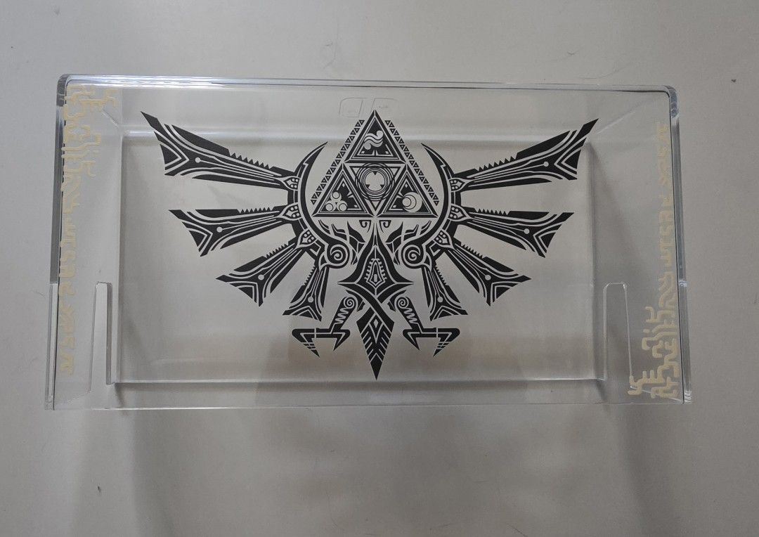 Zelda Triforce Acrylic Display Case for Nintendo Switch (Category: Cases & Covers) located in Caloocan City. Submitted by kcstyles01 (Listing ID 1431031630, Image 1). Description: Zelda Triforce Acrylic Display Case for Nintendo Switch - Compatible for Nintendo Switch version 1 - Available for COD RFS: Upgraded console to version 2 Location: South Caloocan / Sta. Maria, Bulacan.