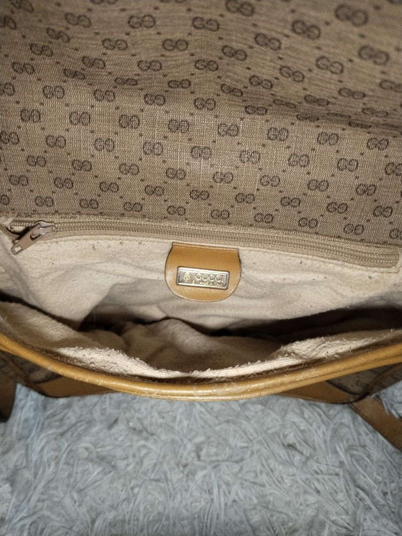 80s Gucci Flap Sling Bag (Category: Luxury Bags & Wallets) located in Pasig City. Submitted by loveforlux_2025 (Listing ID 1435362701, Image 3). Description: - Authentic Gucci shoulder bag - Features the iconic GG monogram pattern - Flap closure with leather trim - Fabric-lined interior with zipper pocket - Adjustable shoulder strap - Made in Italy.