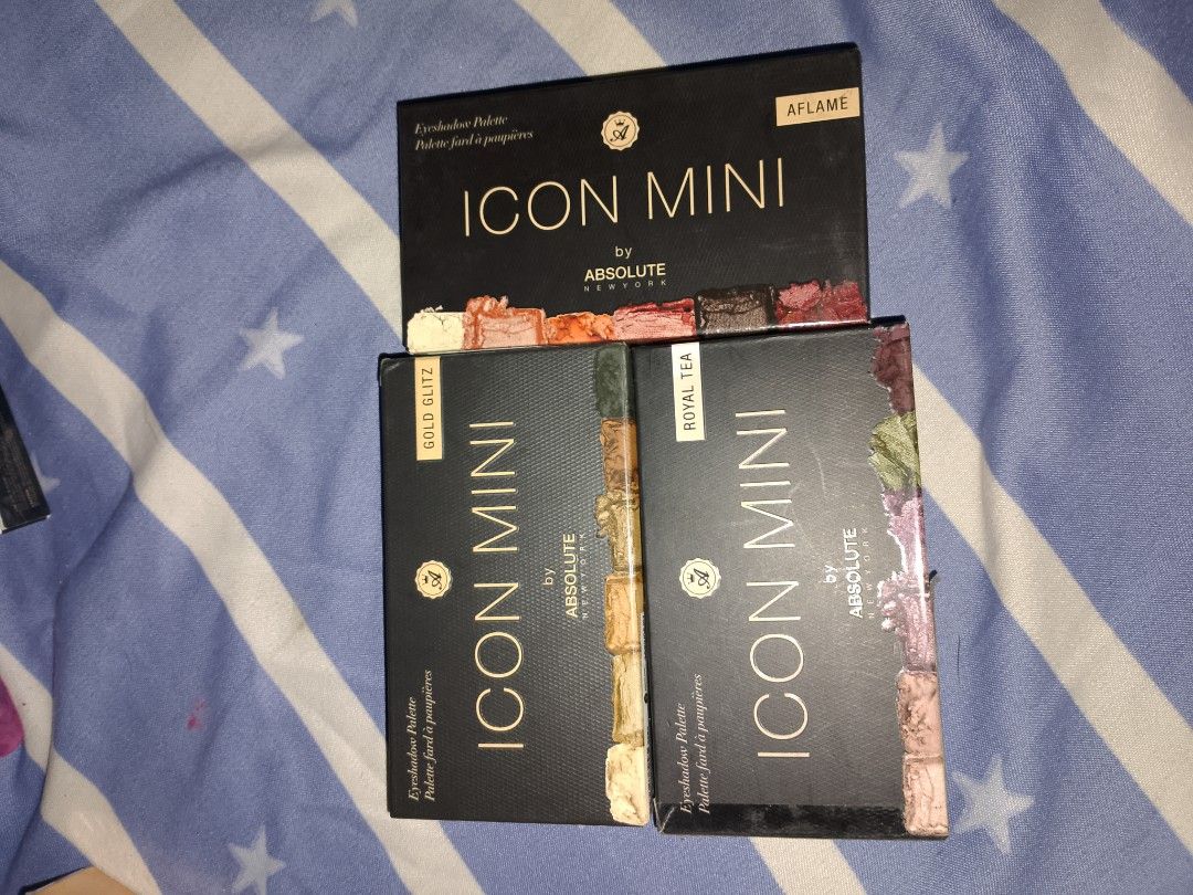 Absolute New York Icon Mini Eyeshadow Palette (Category: Makeup) located in Batangas. Submitted by agfdc (Listing ID 1435483165, Image 1). Description: (1 each avail per shade) Three Absolute New York Icon Mini eyeshadow palettes - Shade: Aflame, Gold Glitz, Royal Tea Yes, legit and orig sya. No to fake tayo girlies Pm lang if may katanungan. Willing din magsend ng ids :)) .