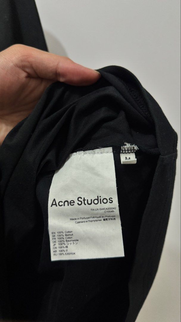 Acne Studios Black T-shirt (Category: Tshirts & Polo Shirts ) located in Manila. Submitted by ayayrown (Listing ID 1435498402, Image 3). Description: Acne Studios black shirt with red print Size is M but fits like L RFS: I lowkey got bigger lol - color is 9.5/10, used like 5 times only - no issues or anything aside from its used haha - logo print is rubberized/raised idk how u call it Lalamove/Meetup Taft DLSU .