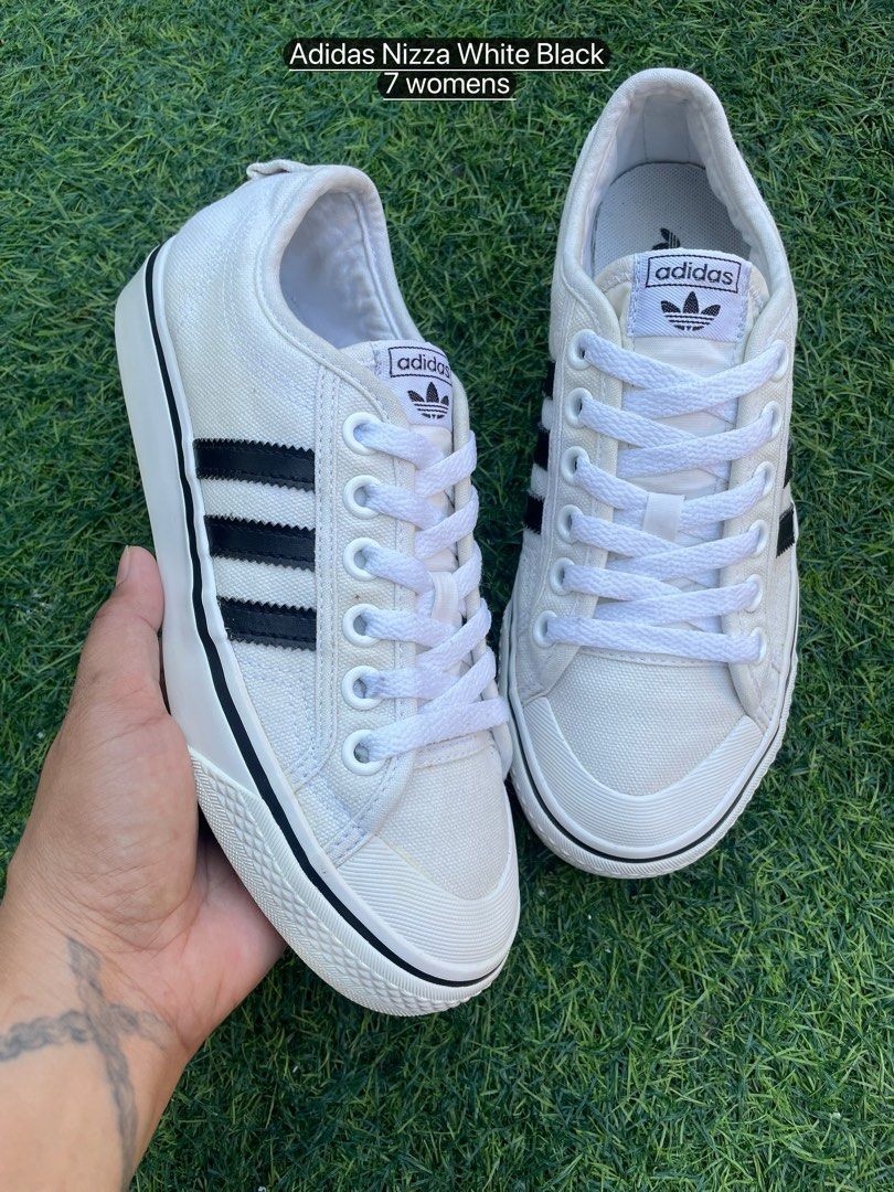 Adidas Nizza White Black (Category: Sneakers) located in Muntinlupa City. Submitted by shefindsthrift (Listing ID 1435370249, Image 1). Description: - Adidas Nizza sneakers - White upper with black stripes - Gum sole - Size: 7 womens 5.5 mens 1k.