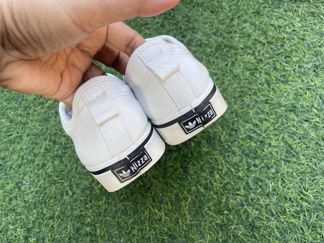 Adidas Nizza White Black (Category: Sneakers) located in Muntinlupa City. Submitted by shefindsthrift (Listing ID 1435370249, Image 3). Description: - Adidas Nizza sneakers - White upper with black stripes - Gum sole - Size: 7 womens 5.5 mens 1k.