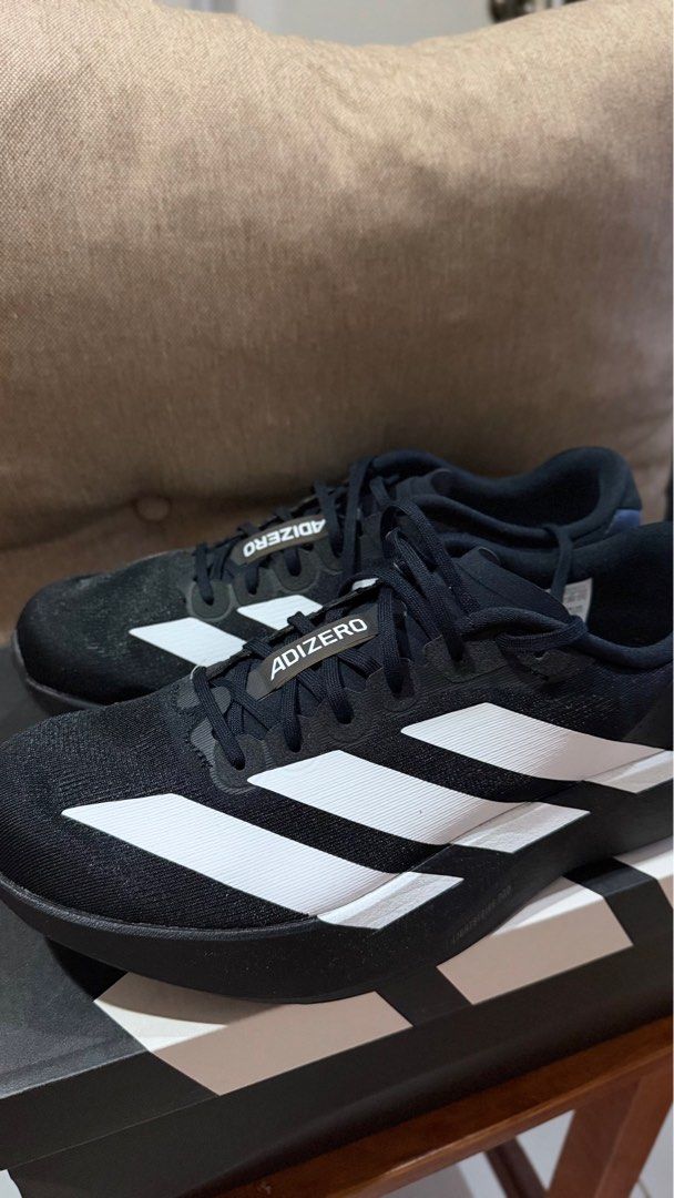 Adizero Evo Black (Category: Sneakers) located in Pasig City. Submitted by declutterzzzz (Listing ID 1435397330, Image 1). Description: ✅ Used only 1-2 times ✅ Bought from Footlocker Greenhills ✅ can pass as new ✅ slight Nego Rfs: decluttering .