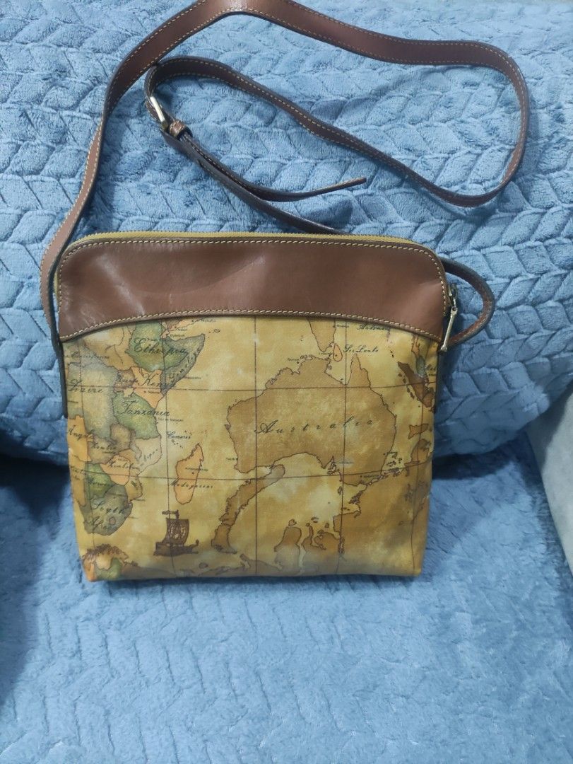 Alviero Martini Geo Map Crossbody Bag (Category: Luxury Bags & Wallets) located in Cainta. Submitted by luxesparkle (Listing ID 1435490065, Image 2). Description: - Alviero Martini crossbody bag -U.S bought -Very pretty in actual .