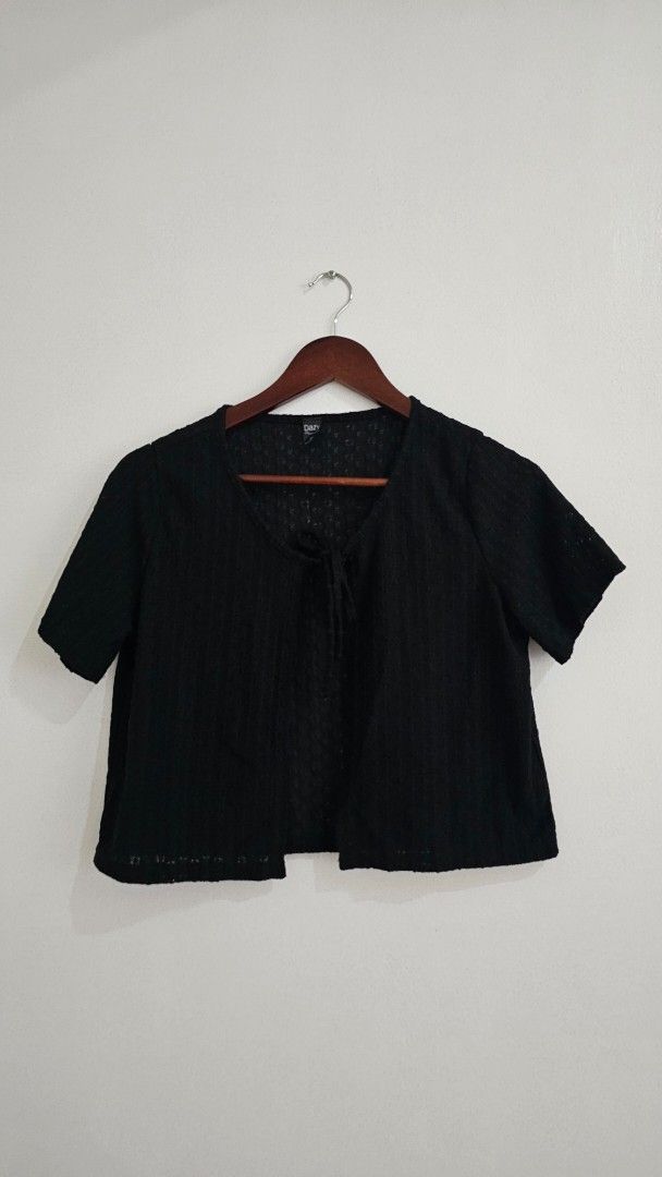 Black Bolero (Category: Others Tops) located in Antipolo. Submitted by secondbloomph (Listing ID 1435468402, Image 1). Description: - Black bolero - Short sleeves - Textured pattern - Lightweight fabric - V-neck design - Ideal for layering.