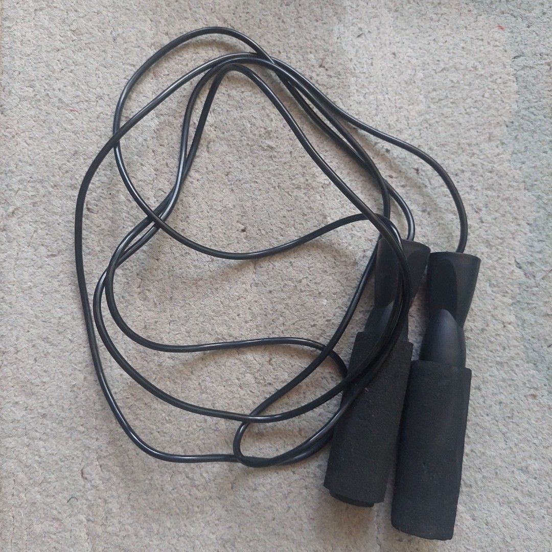 Black Jump Rope with Foam Handles (Category: Cardio & Fitness Machines) located in Mandaluyong City. Submitted by locolady (Listing ID 1435400613, Image 1). Description: - Black jump rope - Comfortable foam handles - Durable rope material - Contoured handles for better grip - Suitable for various fitness activities.