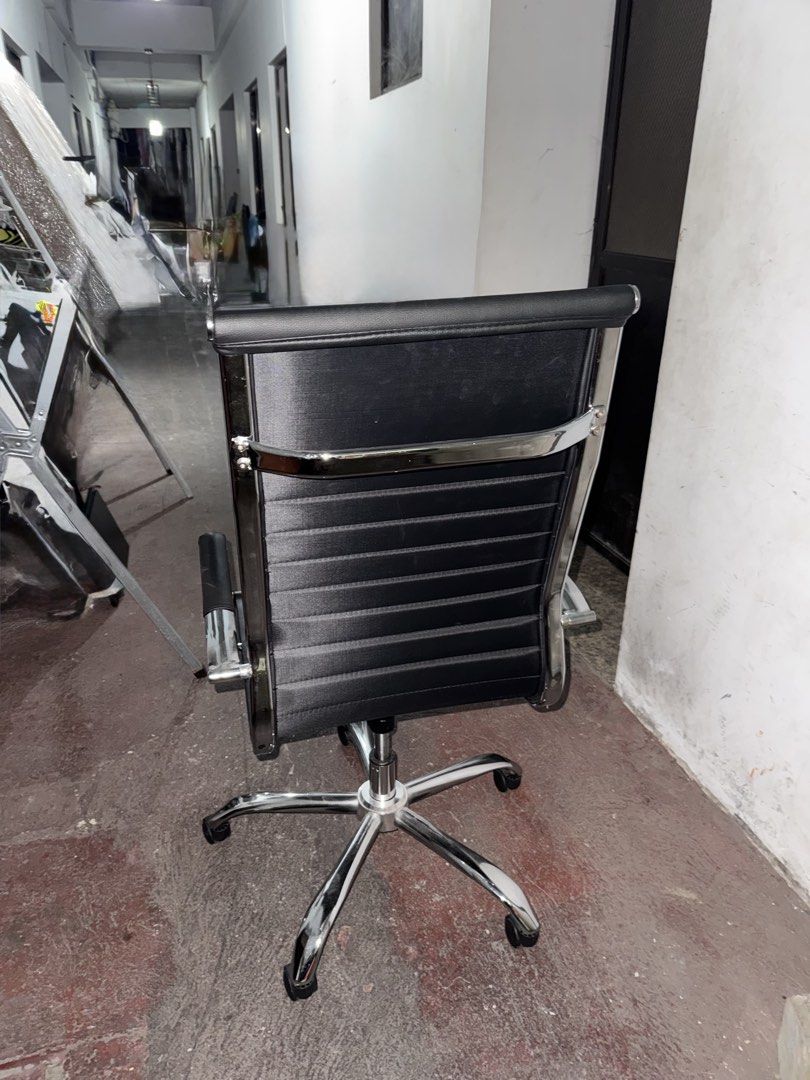 Black Office Chair with Chrome Base (Category: Chairs) located in Muntinlupa City. Submitted by boadogabb97104 (Listing ID 1435341140, Image 2). Description: - Stylish black office chair - Chrome base - High-back design with horizontal stitching - Comfortable armrests - Swivel base for easy movement - Suitable for home or office ✨ FOR SALE: Home Furniture (Good Condition!) ✨ 📍 Location: Muntinlupa City Selling these items — perfect for home, con