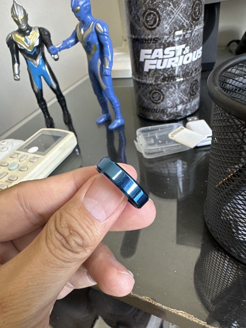 Blue Ring (Category: Rings) located in Kuala Lumpur. Submitted by daviskhoong (Listing ID 1435375478, Image 1). Description: - Solid blue ring - Shiny, metallic finish - Simple band design - Sleek and modern.